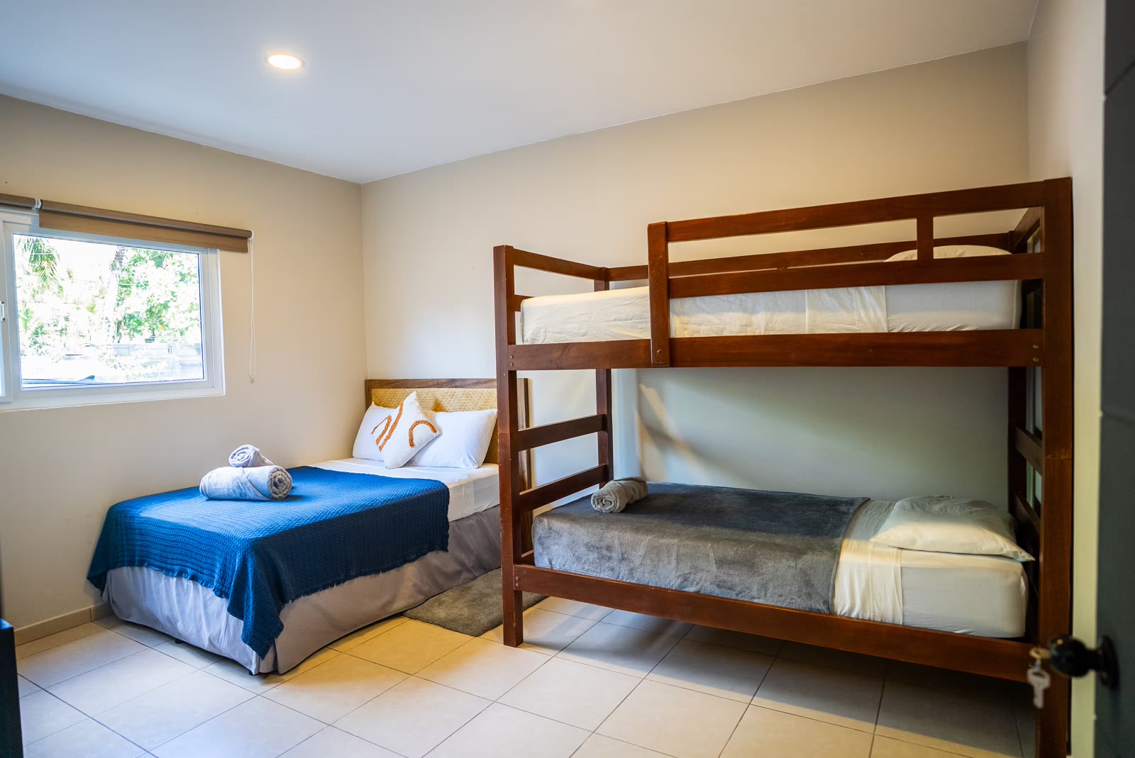 Second view of bedroom three's beds